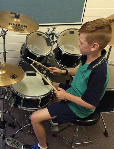 Learn Through Music - Boy Drummer